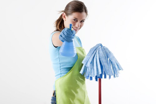 Carpet cleaning team with safety equipment and insured service planning
