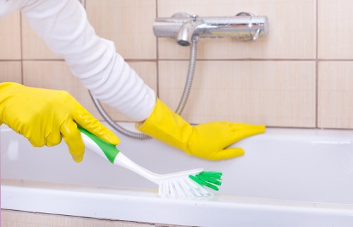 Carpet cleaners using PPE during a safe cleaning service